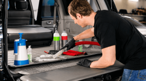cleaning the car with auto shield detailing accessories