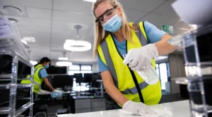 commercial cleaner using commercial spray cleaner and microfibre cloth